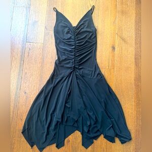 Elegant and fun black dress. Worn a few times. Size S